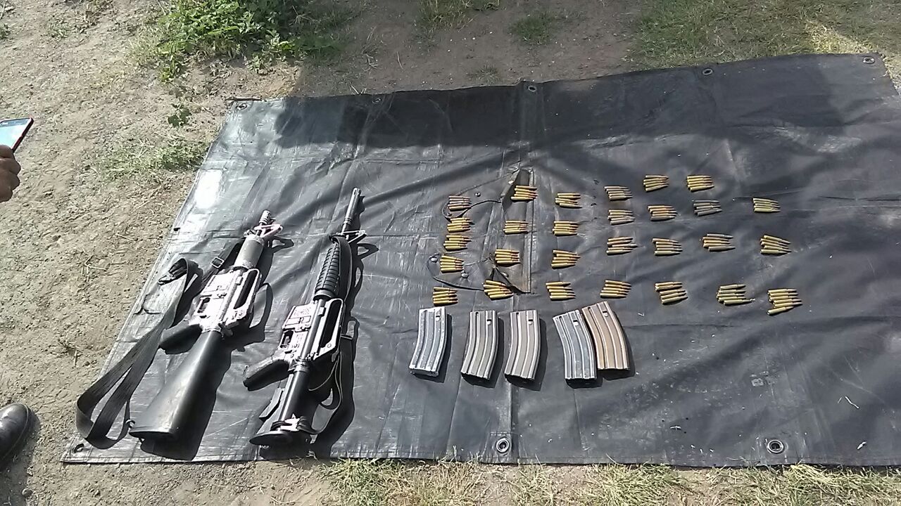 SSP y Sedena detienen a dos con armas largas, cargadores y cartuchos en Aguililla